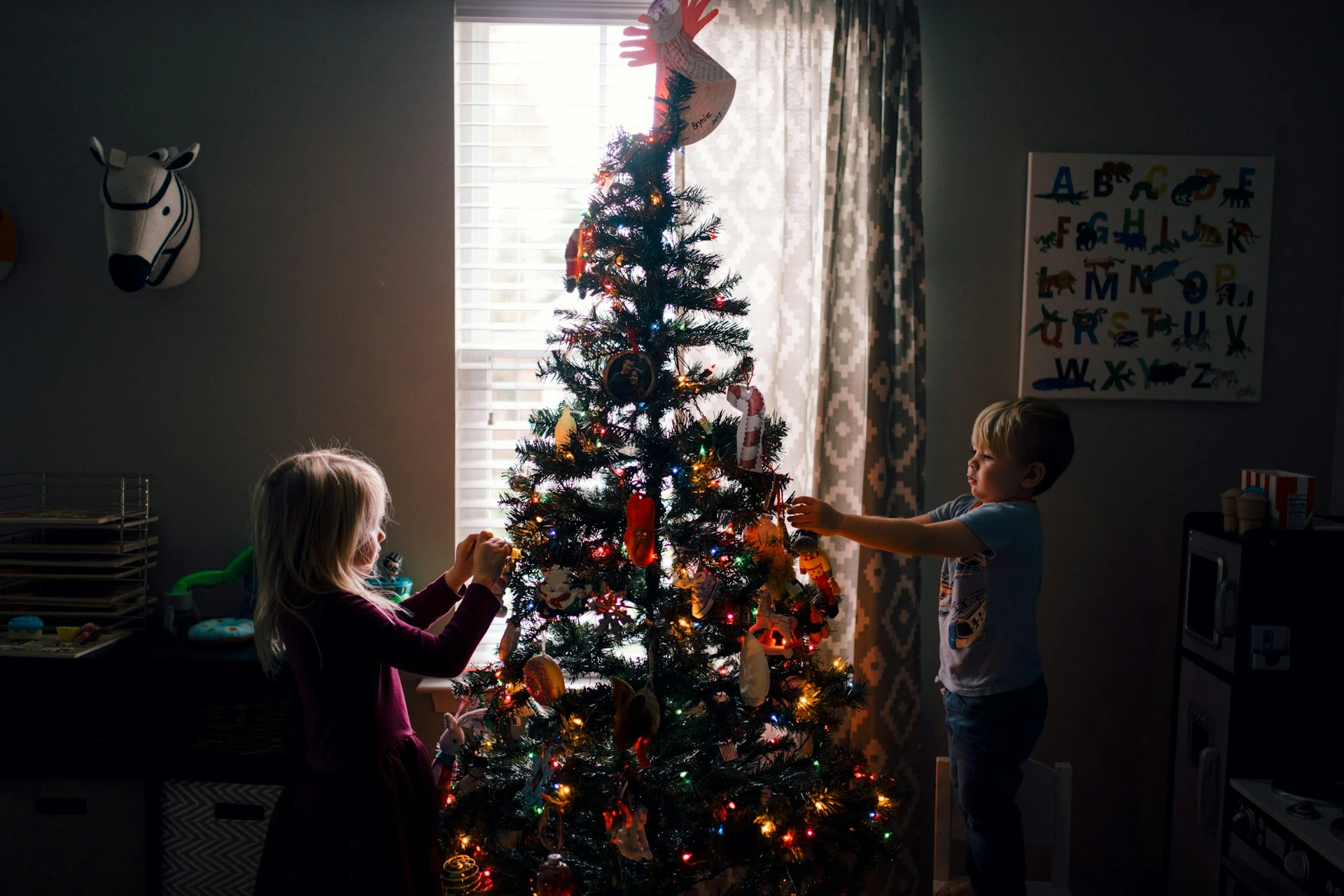 Kids decorating Christmas Tree